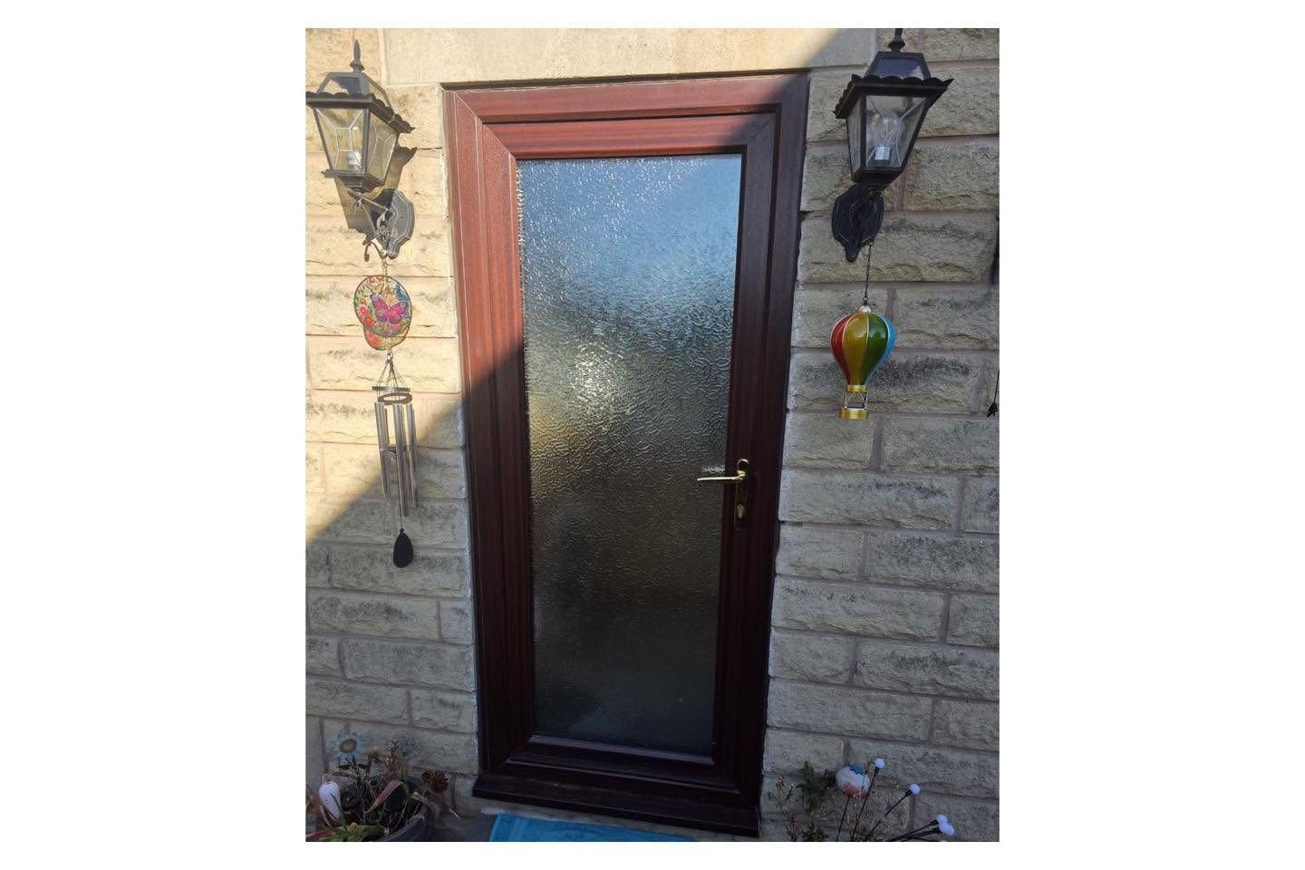 Rosewood door with frosted glazed panel